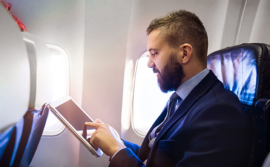 The traveling businessman and his tablet.